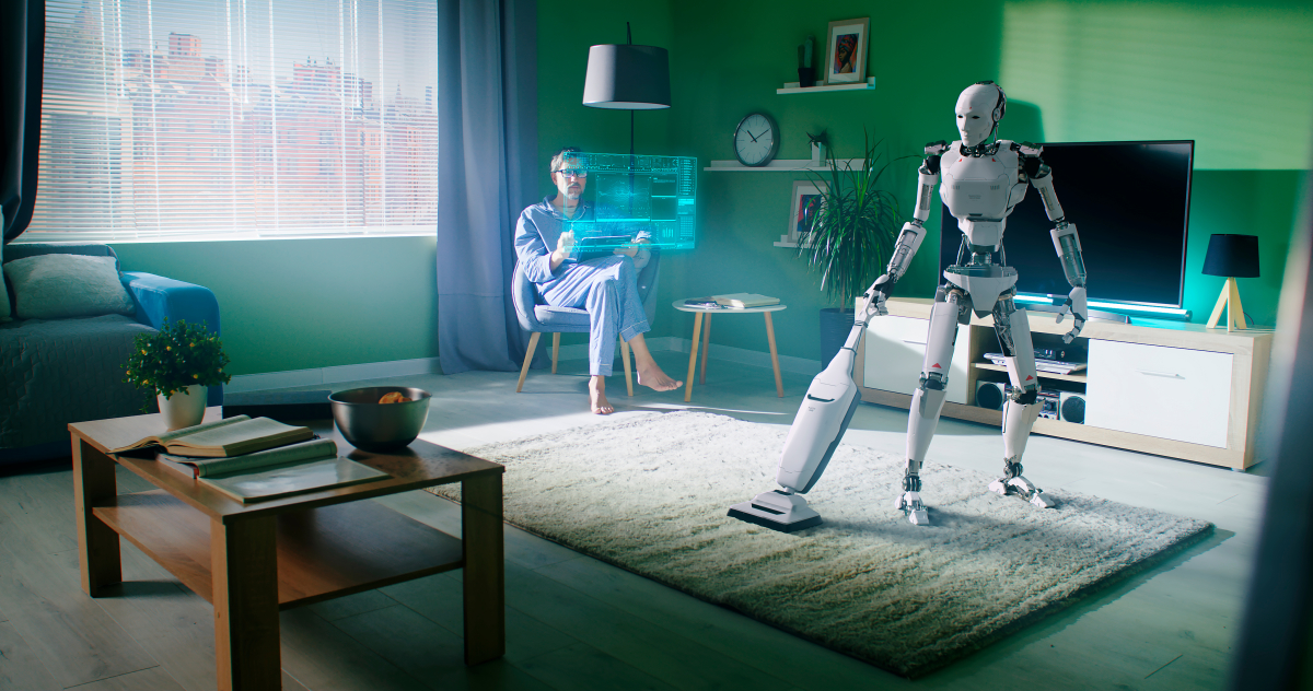 un robot passe l’aspirateur dans un salon dirigé par un homme sur un écran 3D